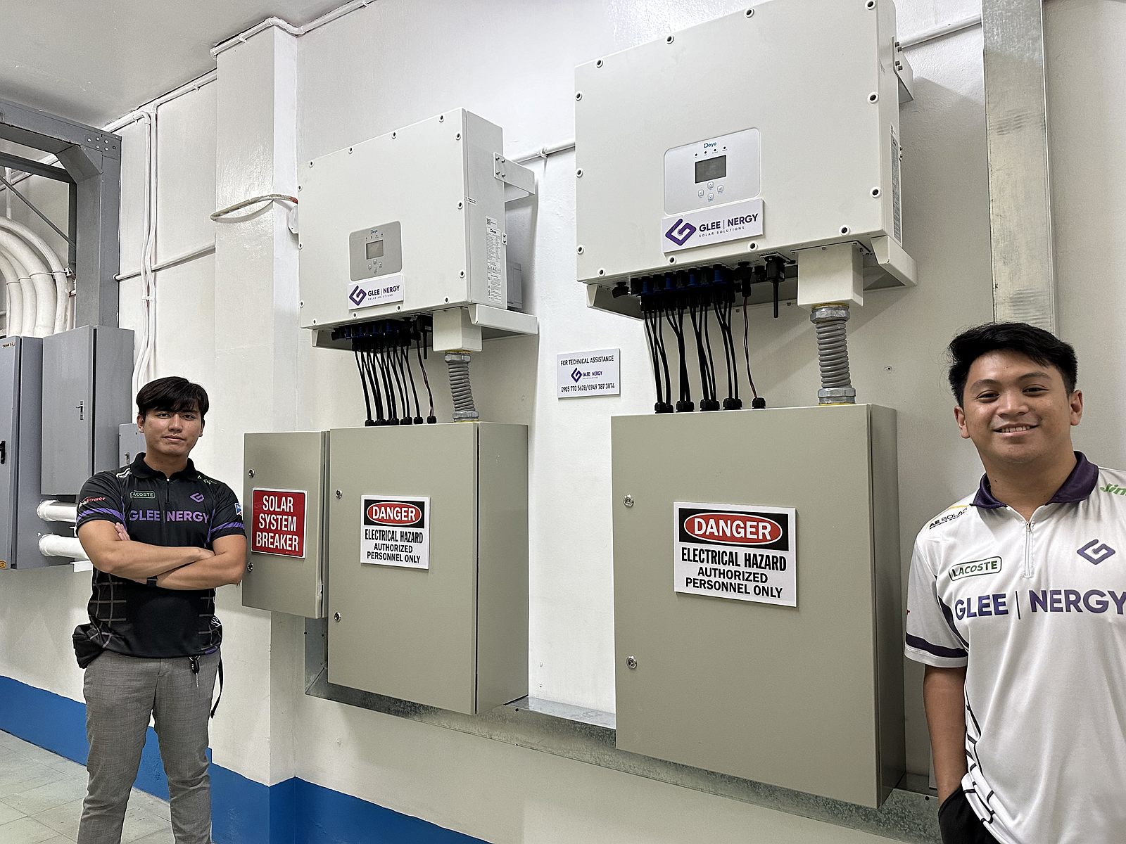 Gleenergy technician working on a solar system breaker panel