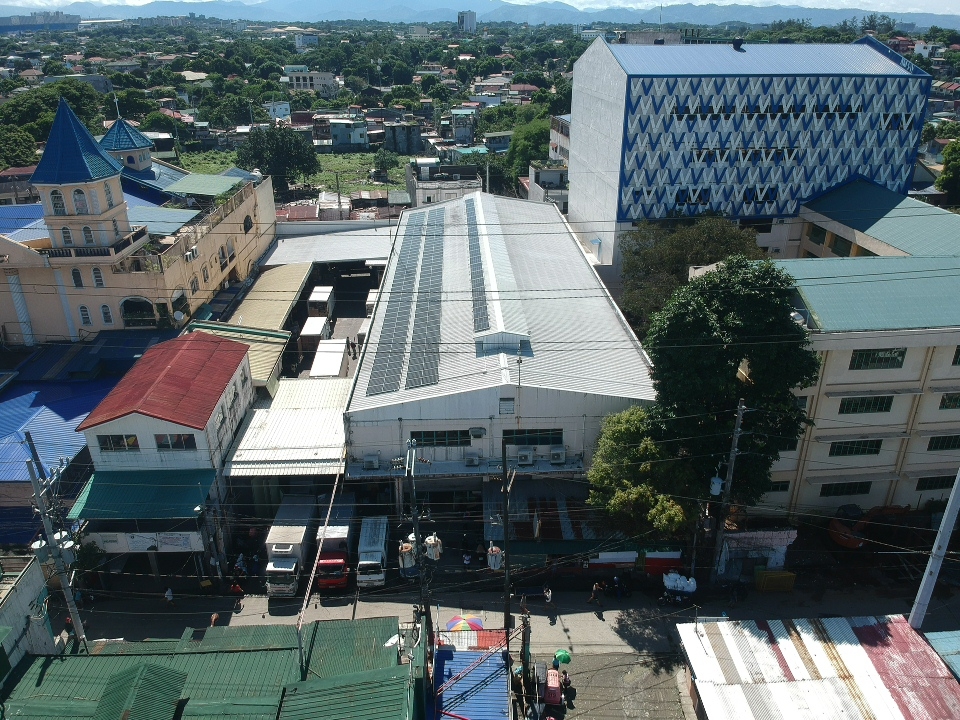 Solar panels on the roof of San Roque Supermarket Main Office in Quezon City